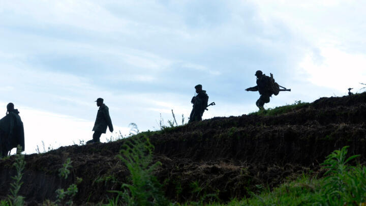 Democratic Republic of Congo Army soldiers advance on November 5, 2013 near Chanzu, 80 kilometres north of regional capital Goma, in the eastern North Kivu region that was one of the M23 rebels' last stands.
